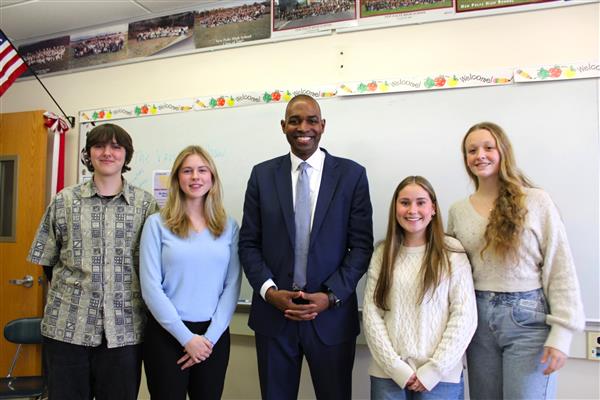  Four students with Lieutenant Governor Antonio Delgado